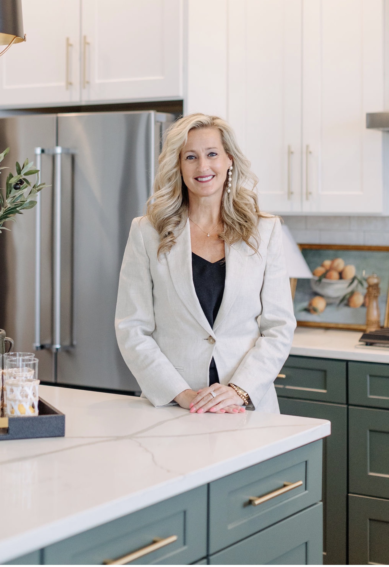 Abby Knarr, Keller Williams Elite realtor in Lancaster PA, in a renovated Lancaster County kitchen